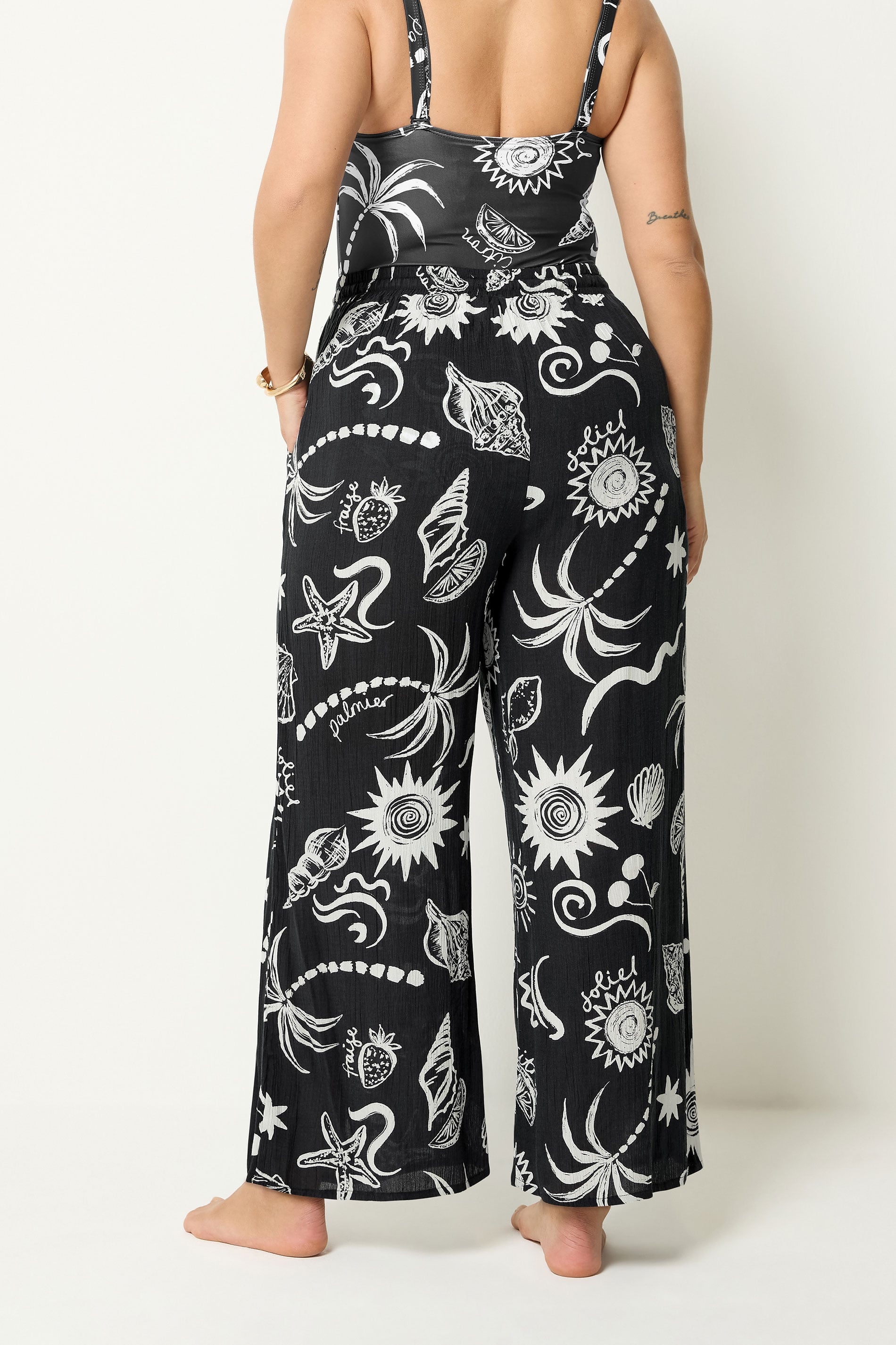 YOURS Plus Size Black Summer Print Crinkle Beachwear Wide Leg Trousers | Yours Clothing 2