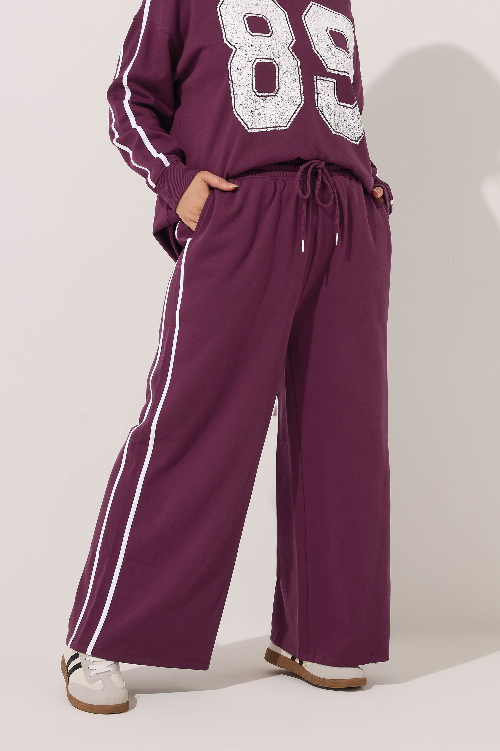 YOURS Plus Size Burgundy Red Side Stripe Wide Leg Joggers | Yours Clothing 1