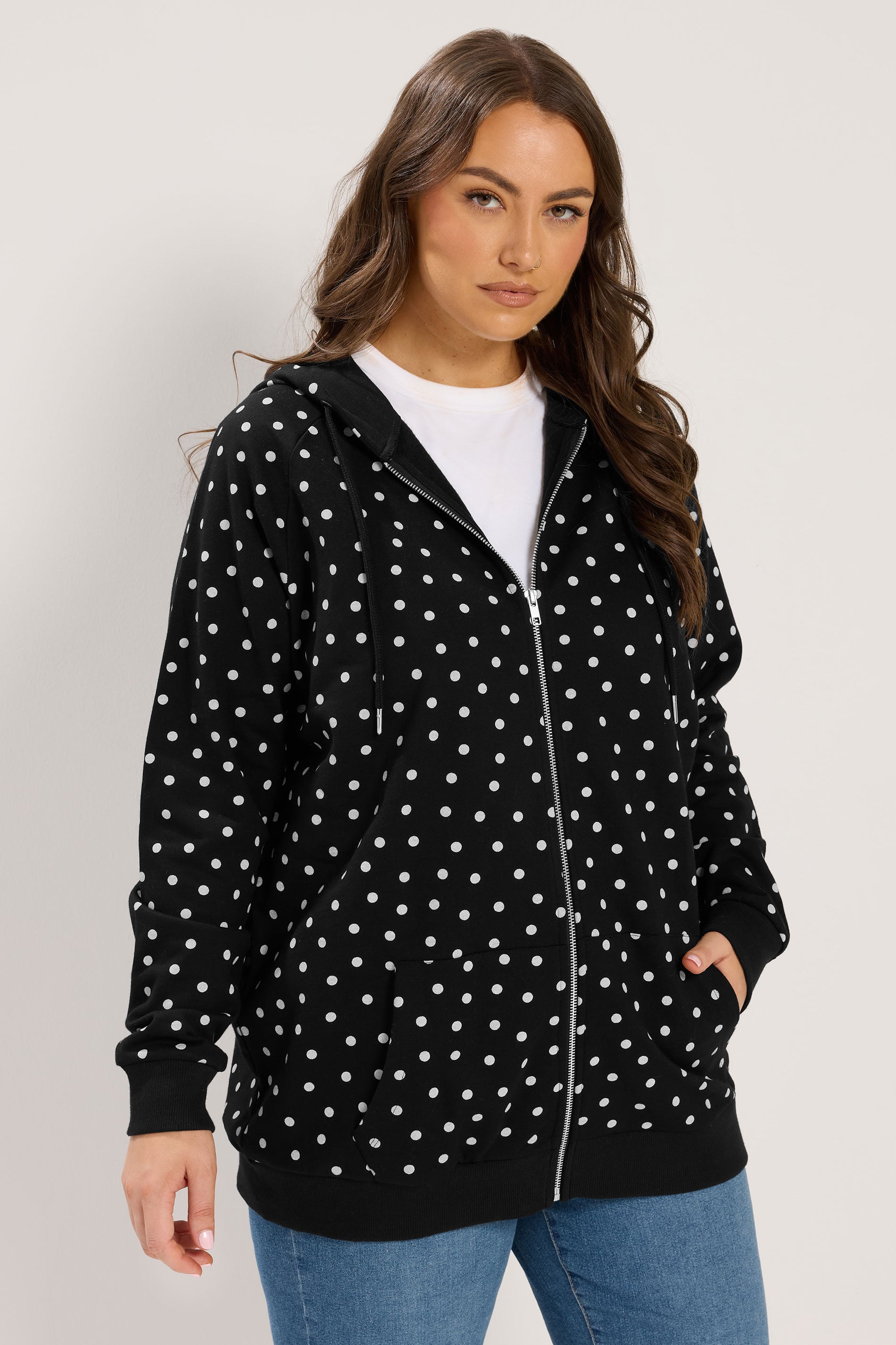 YOURS Plus Size Black Polka Dot Zip Through Raglan Hoodie | Yours Clothing 1