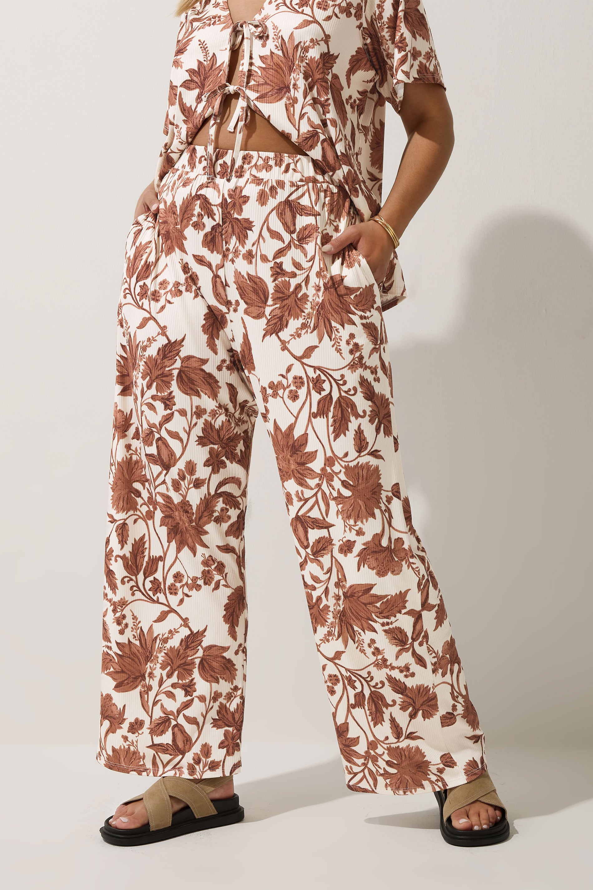  LIMITED COLLECTION Plus Size Brown Floral Wide Leg Trousers | Yours Clothing 1