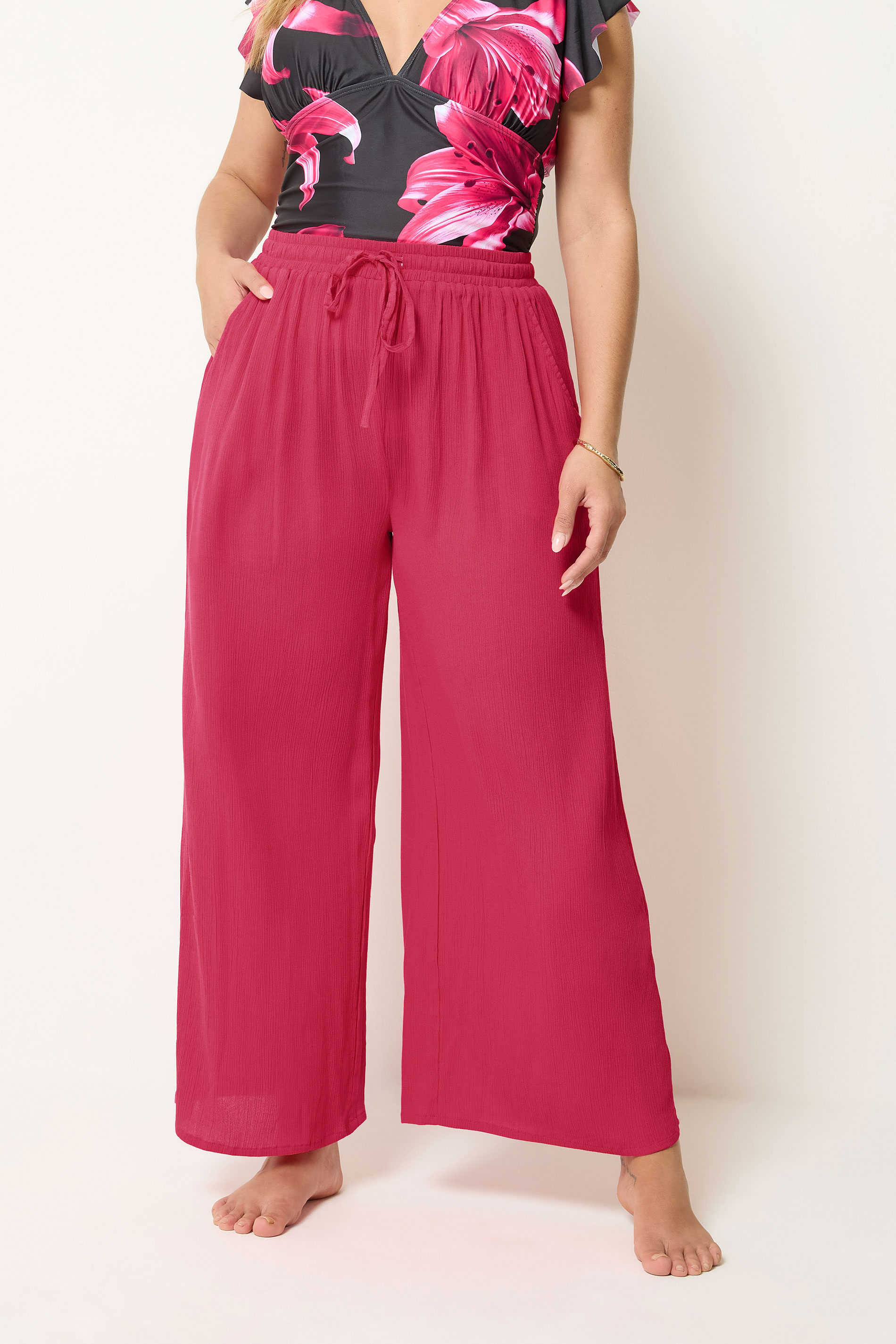 YOURS Plus Size Hot Pink Crinkle Texture Wide Leg Trousers | Yours Clothing 1