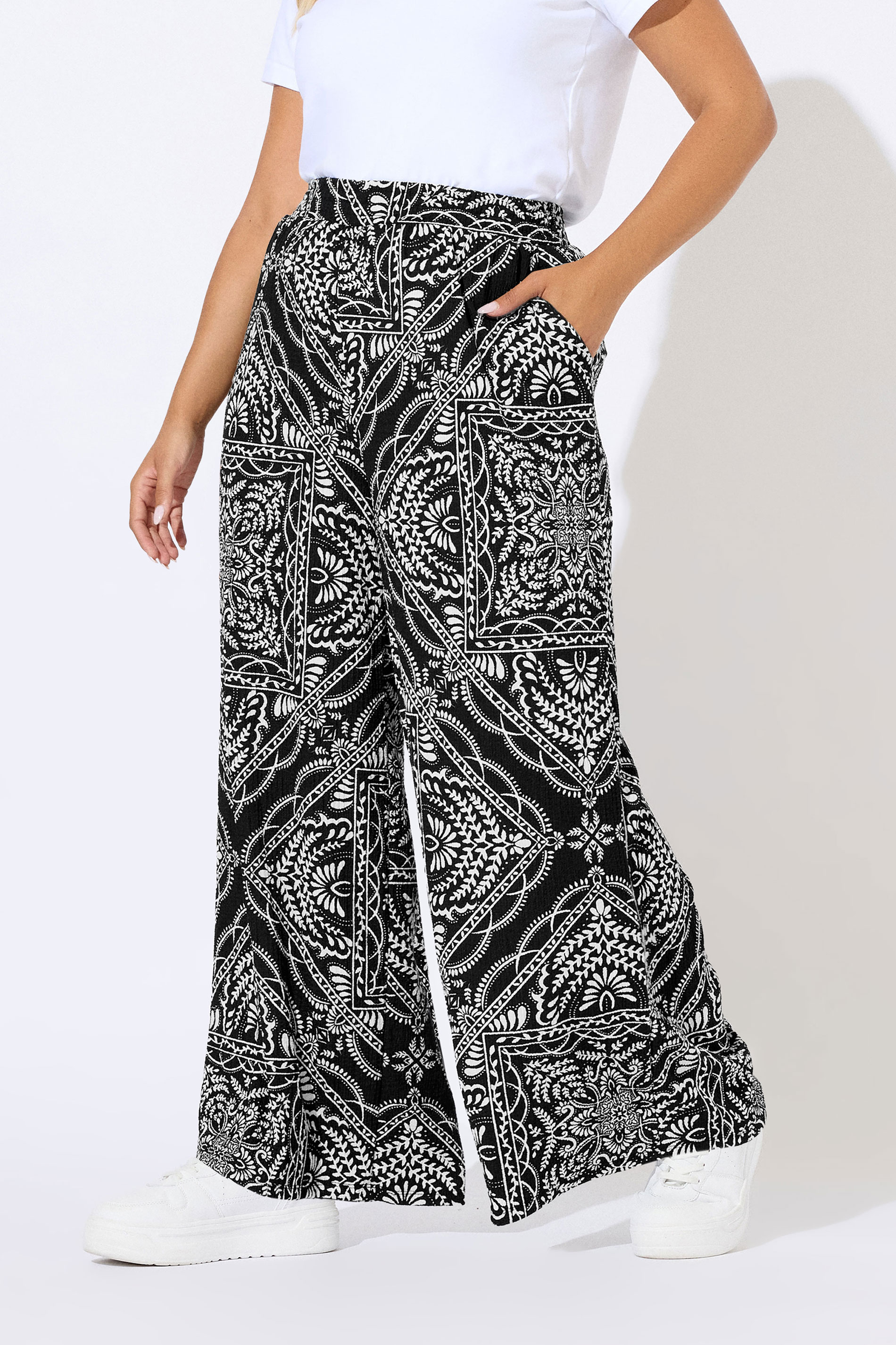 YOURS Plus Size Black Bandana Print Textured Wide Leg Trousers | Yours Clothing 1