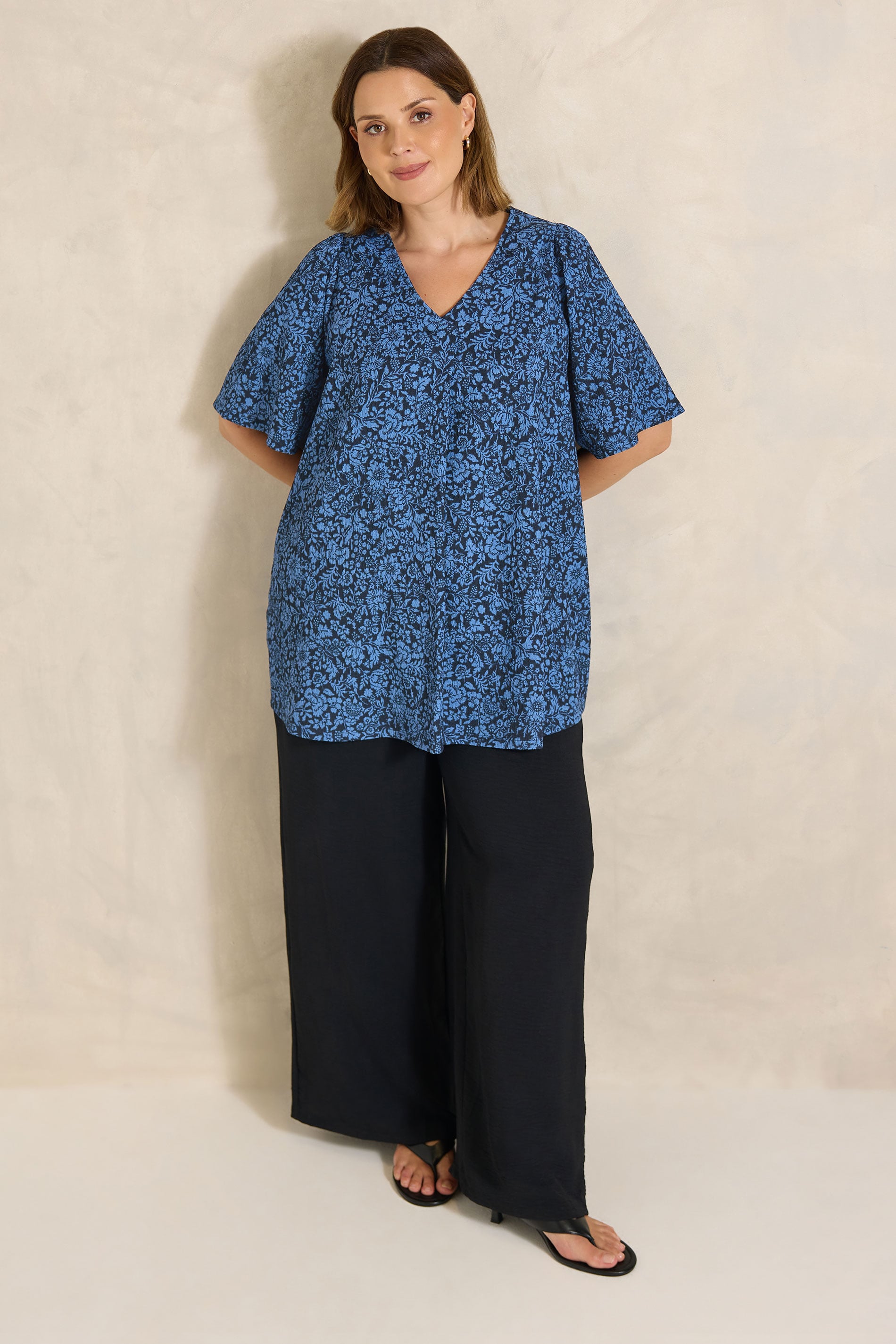 EVANS Plus Size Navy Blue Floral Pleat Front Angel Sleeve Top | Evans 1