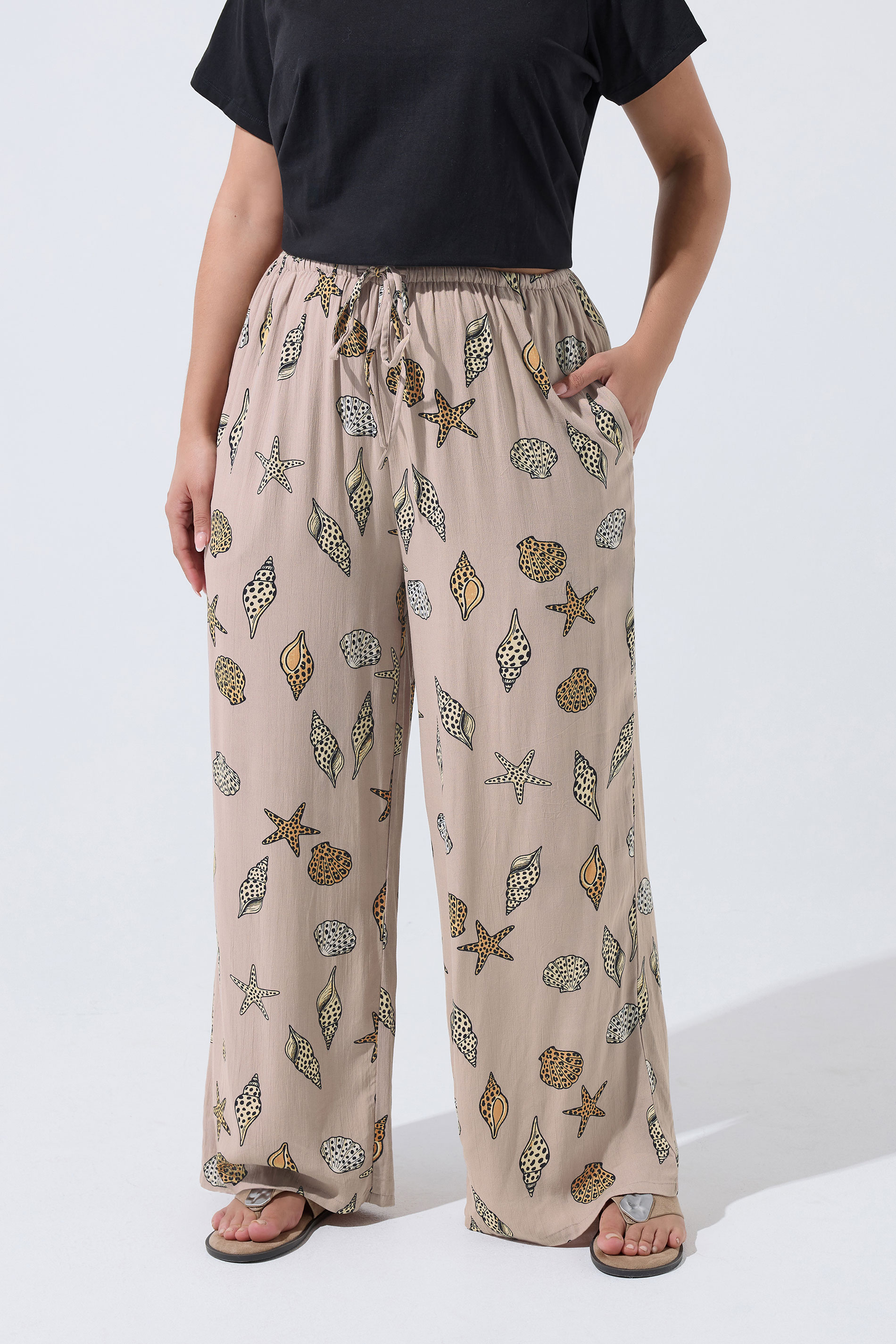 LIMITED COLLECTION Plus Size Natural Brown Leopard Shell Trousers | Yours Clothing 1