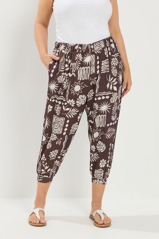 YOURS Plus Size Chocolate Brown Floral Cropped Harem Trousers | Yours Clothing 1