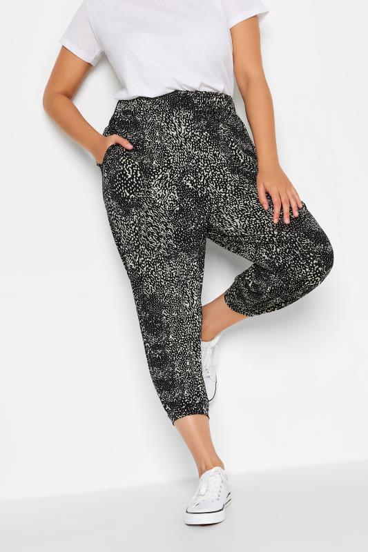 YOURS Plus Size Black Mixed Animal Print Cropped Harem Joggers | Yours Clothing 1