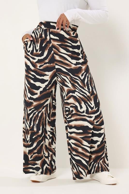 YOURS Plus Size Black Animal Print Trousers | Yours Clothing 1