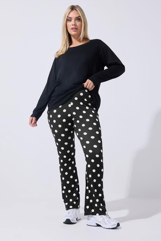 LIMITED COLLECTION Plus Size Black Polka Dot Flared Trousers | Yours Clothing 1