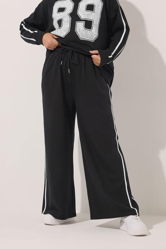 YOURS Plus Size Black Wide Leg Side Stripe Joggers | Yours Clothing 1