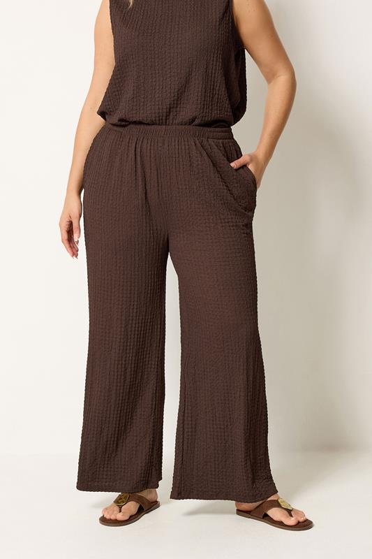 YOURS Plus Size Brown Bubble Texture Wide Leg Trousers | Yours Clothing 1