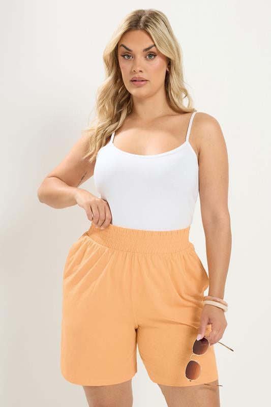 YOURS Plus Size Orange Shirred Waist Shorts | Yours Clothing 1