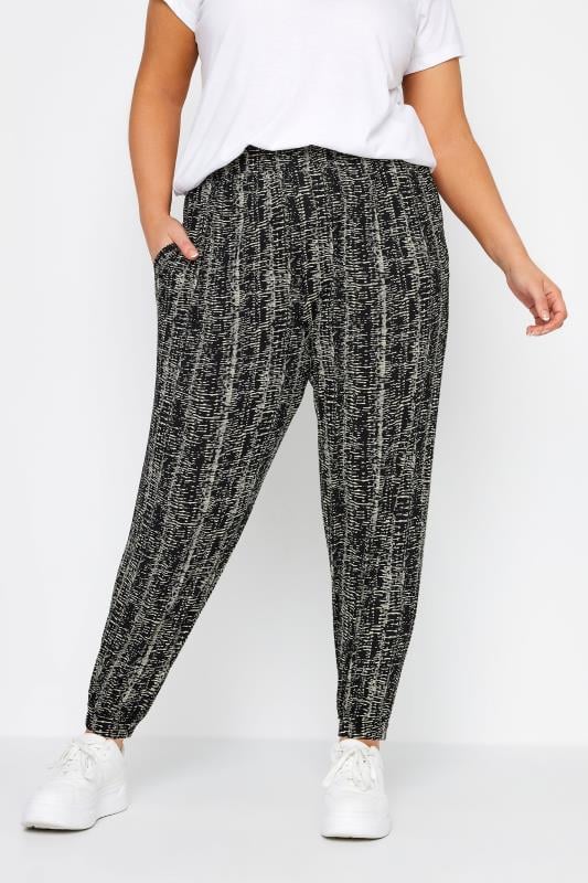 YOURS Plus Size Black Abstract Print Harem Style Joggers | Yours Clothing 1