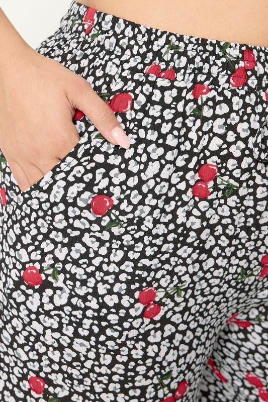 YOURS Plus Size Black Leopard & Cherry Print Crinkle Beachwear Wide Leg Trousers | Yours Clothing 4