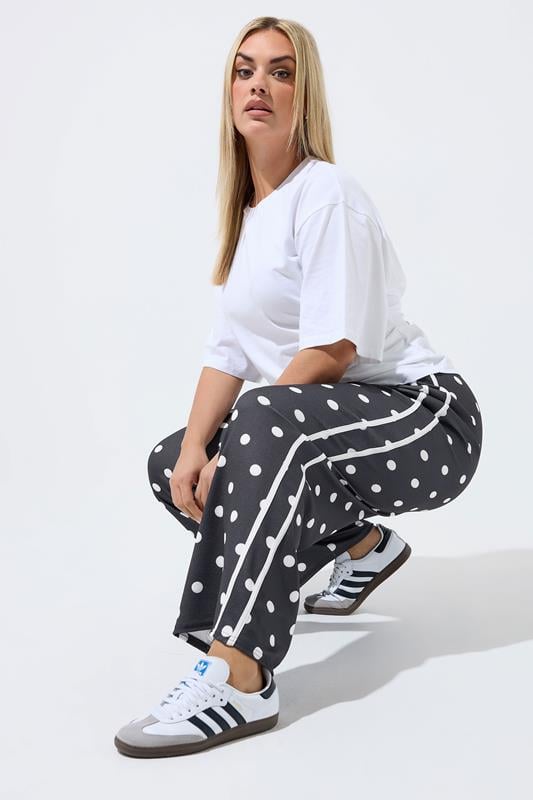 LIMITED COLLECTION Plus Size Black Polka Dot Side Stripe Trousers | Yours Clothing 1