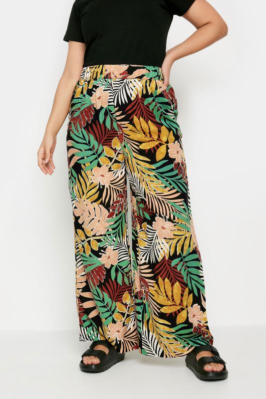 YOURS Plus Size Black Tropical Print Wide Leg Trousers | Yours Clothing 1