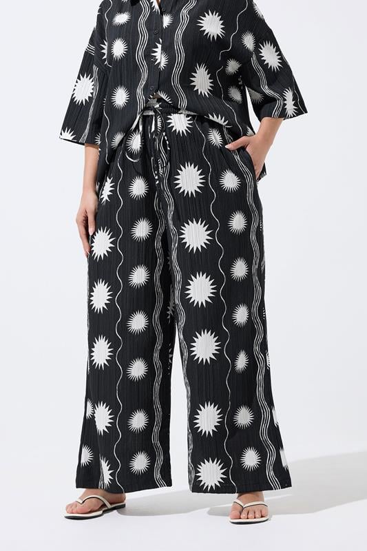 LIMITED COLLECTION Plus Size Black Sun Crinkle Trousers | Yours Clothing 1