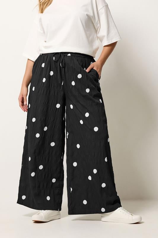  YOURS Curve Black Polka Dot Wide Leg Trousers