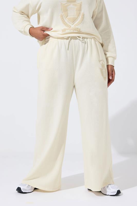 LIMITED COLLECTION Plus Size Cream 'New York' Wide Leg Joggers | Yours Clothing 1
