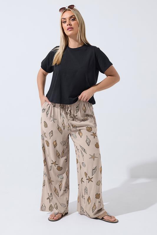 LIMITED COLLECTION Plus Size Natural Brown Leopard Shell Trousers | Yours Clothing 1