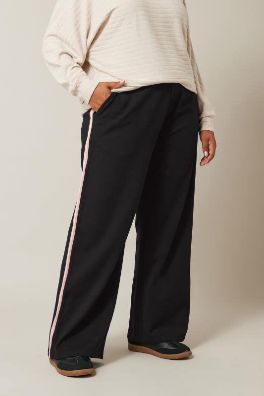 EVANS Curve Black & Pink Side Stripe Wide Leg Trousers | Evans 1