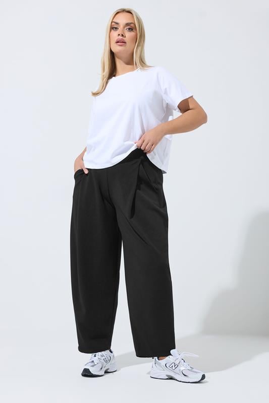 LIMITED COLLECTION Plus Size Black Pleated Barrel Leg Trousers | Yours Clothing 1