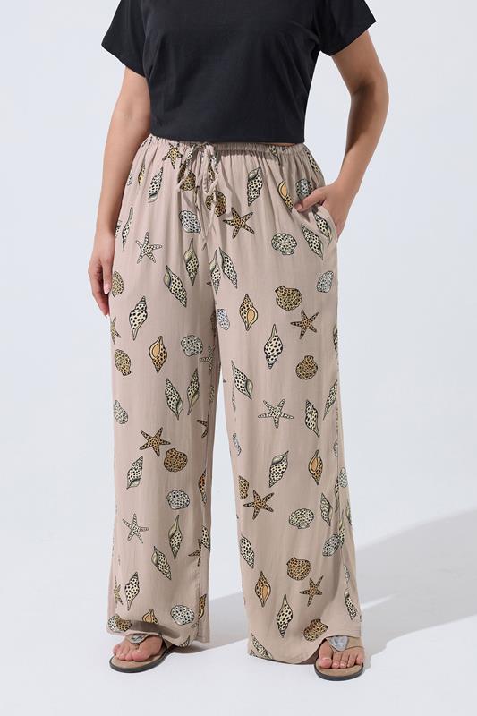 LIMITED COLLECTION Plus Size Natural Brown Leopard Shell Trousers | Yours Clothing 1