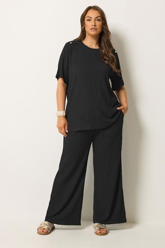 YOURS Plus Size Black Bubble Texture Wide Leg Trousers | Yours Clothing 1