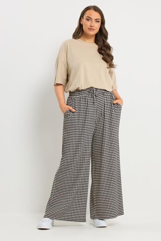 YOURS Plus Size Black Gingham Wide Leg Trousers | Yours Clothing 1