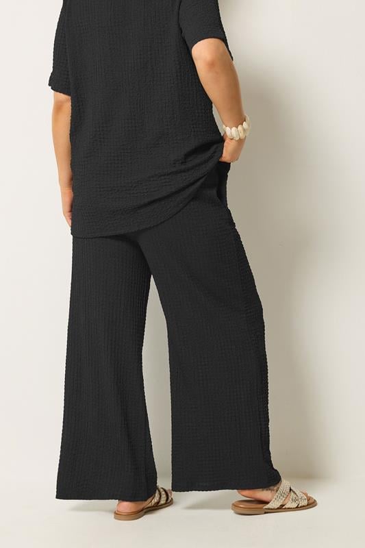YOURS Plus Size Black Bubble Texture Wide Leg Trousers | Yours Clothing 2