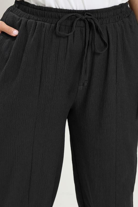 YOURS Plus Size Black Crinkle Barrel Trousers | Yours Clothing 4