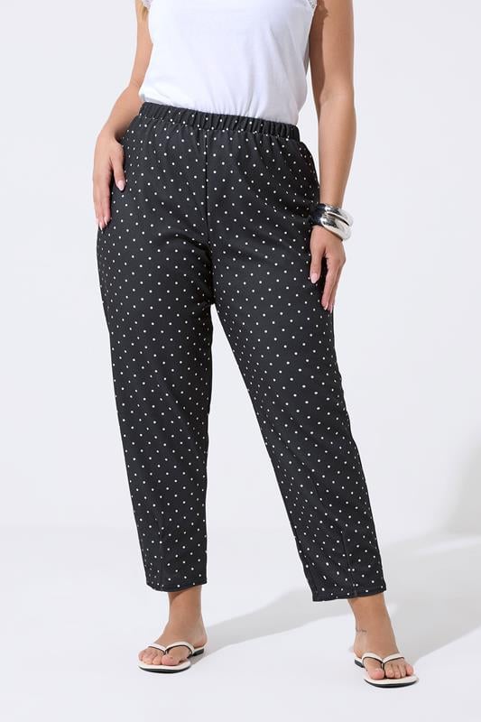 LIMITED COLLECTION Plus Size Black Polka Dot Barrel Trousers | Yours Clothing 1