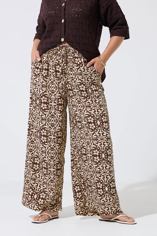 LIMITED COLLECTION Plus Size Brown Abstract Wide Leg Trousers | Yours Clothing 1