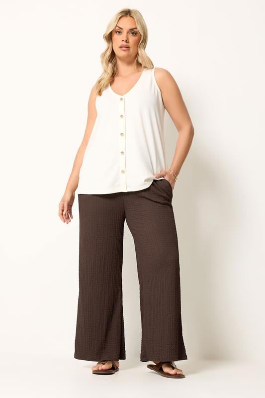 YOURS Plus Size Chocolate Brown Bubble Textured Wide Leg Trousers | Yours Clothing 1