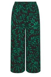 YOURS Curve Black & Green Leaf Print Crinkle Beachwear Wide Leg Trousers