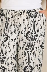 EVANS Plus Size White Abstract Print Wide Leg Trousers | Evans 5