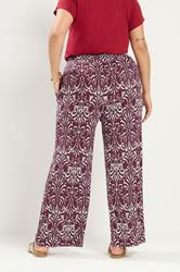 YOURS Plus Size Red Ikat Print Trousers | Yours Clothing 2
