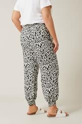 EVANS Plus Size Black Ikat Print Cuffed Harem Trousers | Evans  2