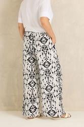 EVANS Plus Size White Abstract Print Wide Leg Trousers | Evans 4