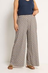 YOURS Plus Size Natural Brown Geometric Textured Wide Leg Trousers | Yours Clothing 1