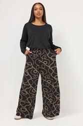 YOURS Plus Size Black Chain Print Wide Leg Trousers | Yours Clothing 1