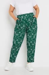 YOURS Plus Size Green Leaf Print Double Pleat Trousers | Yours Clothing 1
