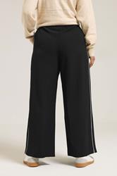 YOURS Plus Size Black Side Stripe Wide Leg Trousers | Yours Clothing 2