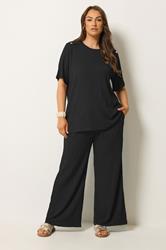 YOURS Plus Size Black Bubble Texture Wide Leg Trousers | Yours Clothing 1