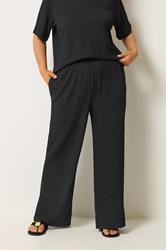 YOURS Plus Size Black Bubble Textured Trousers | Yours Clothing 1