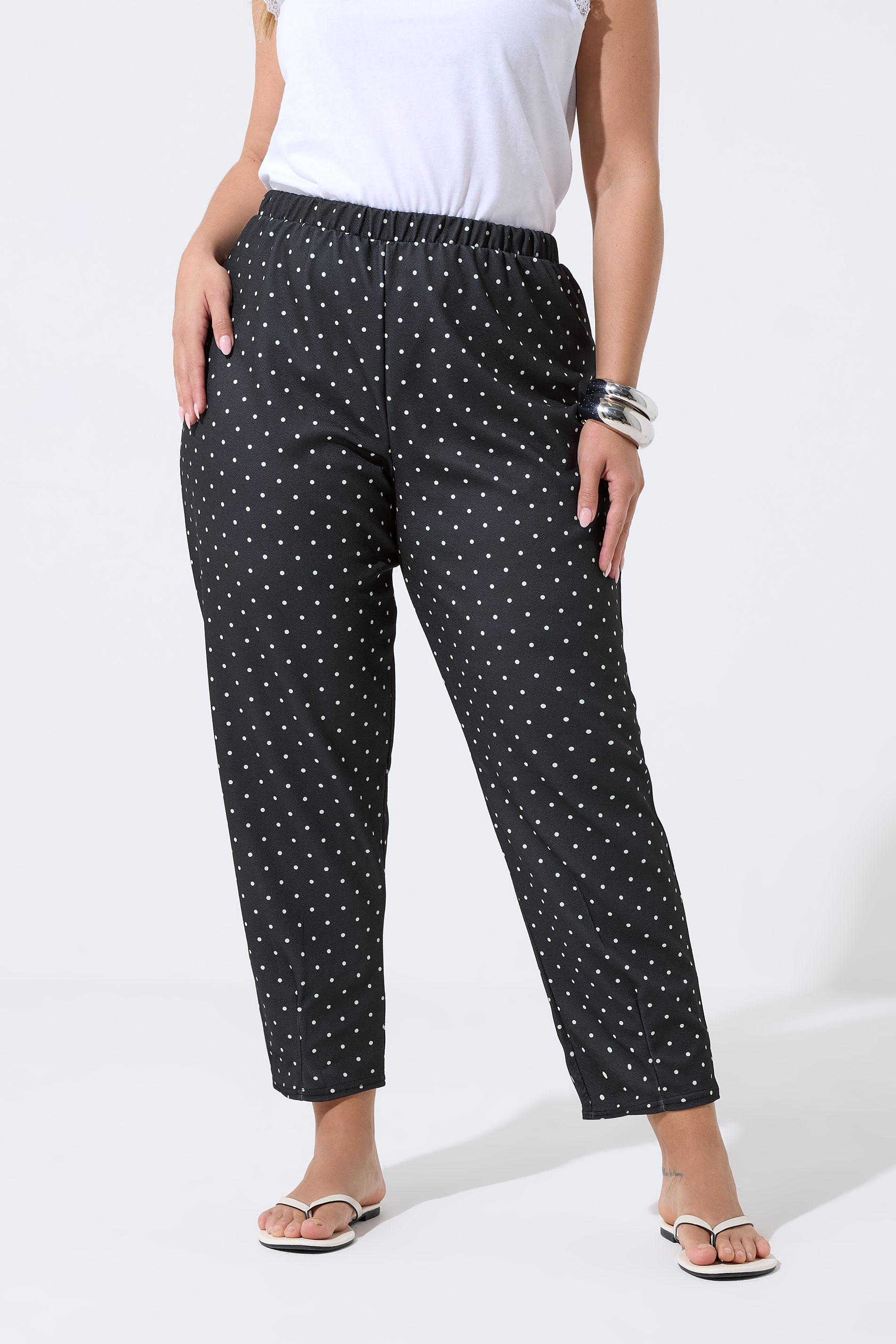 LIMITED COLLECTION Plus Size Black Polka Dot Barrel Trousers | Yours Clothing 1