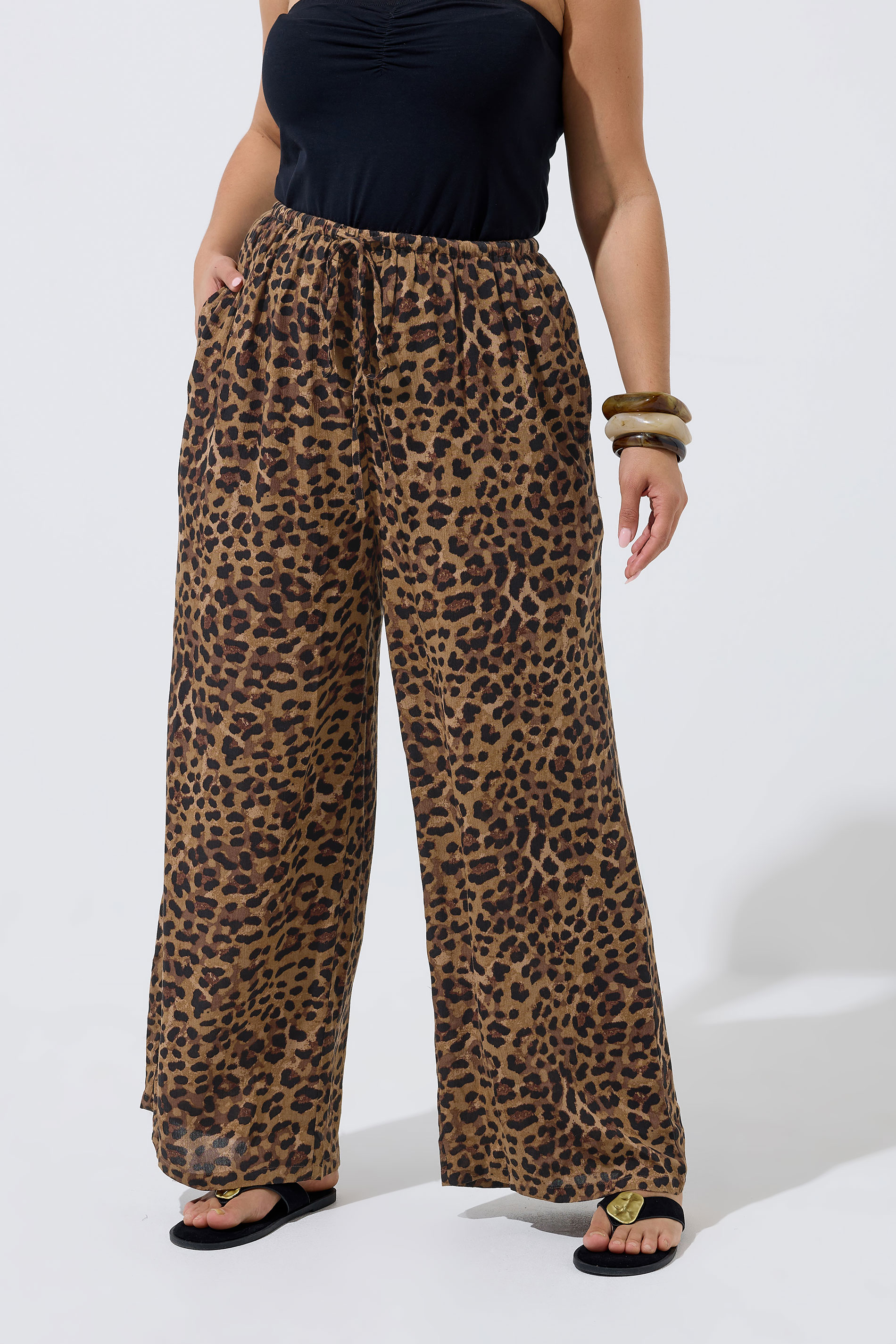LIMITED COLLECTION Plus Size Brown Leopard Crinkle Trousers | Yours Clothing 1