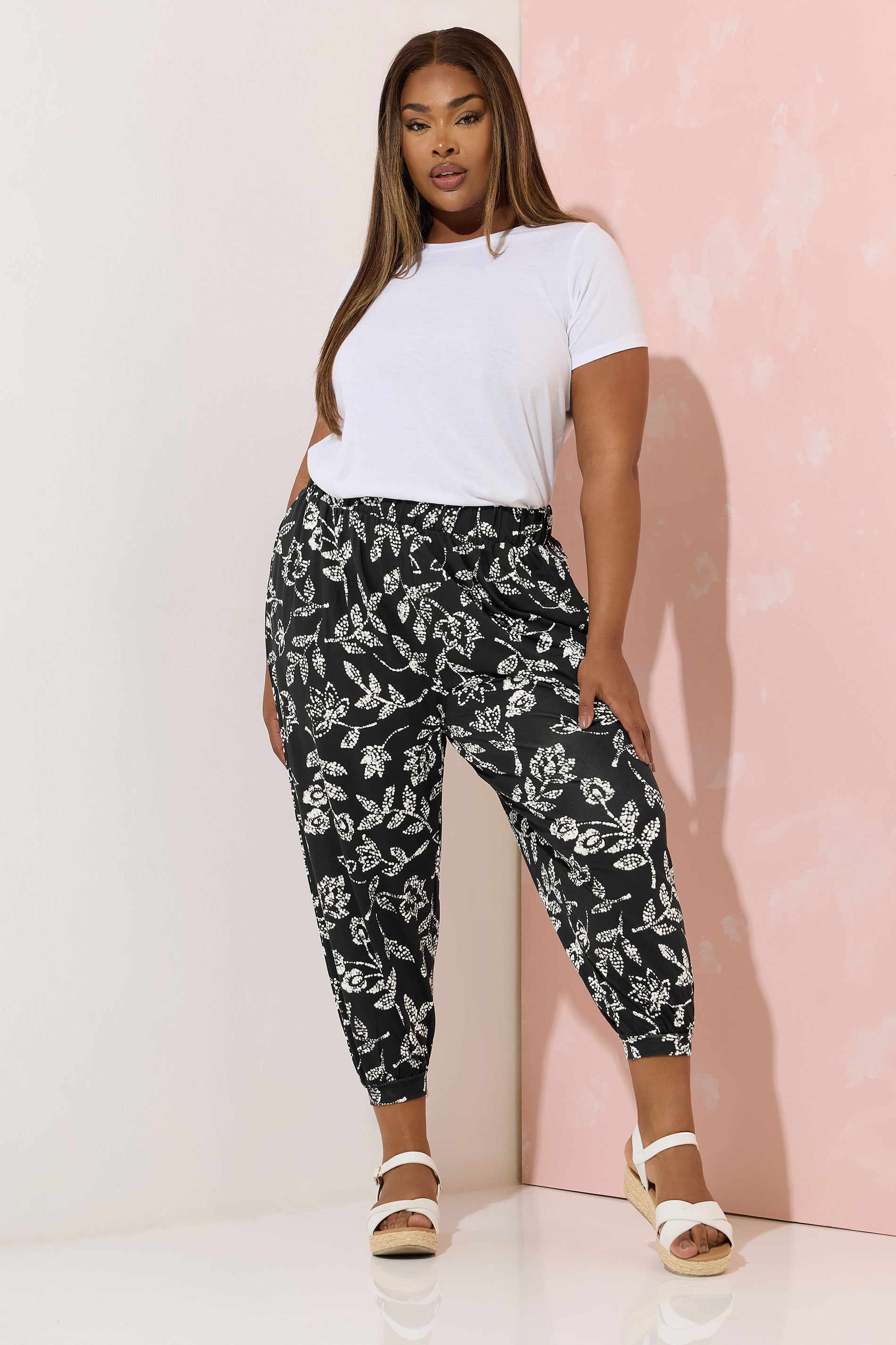 YOURS Plus Size Black Vine Print Cropped Balloon Trousers | Yours Clothing 1